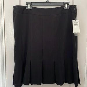 Brand new with tags. Zipper on the side